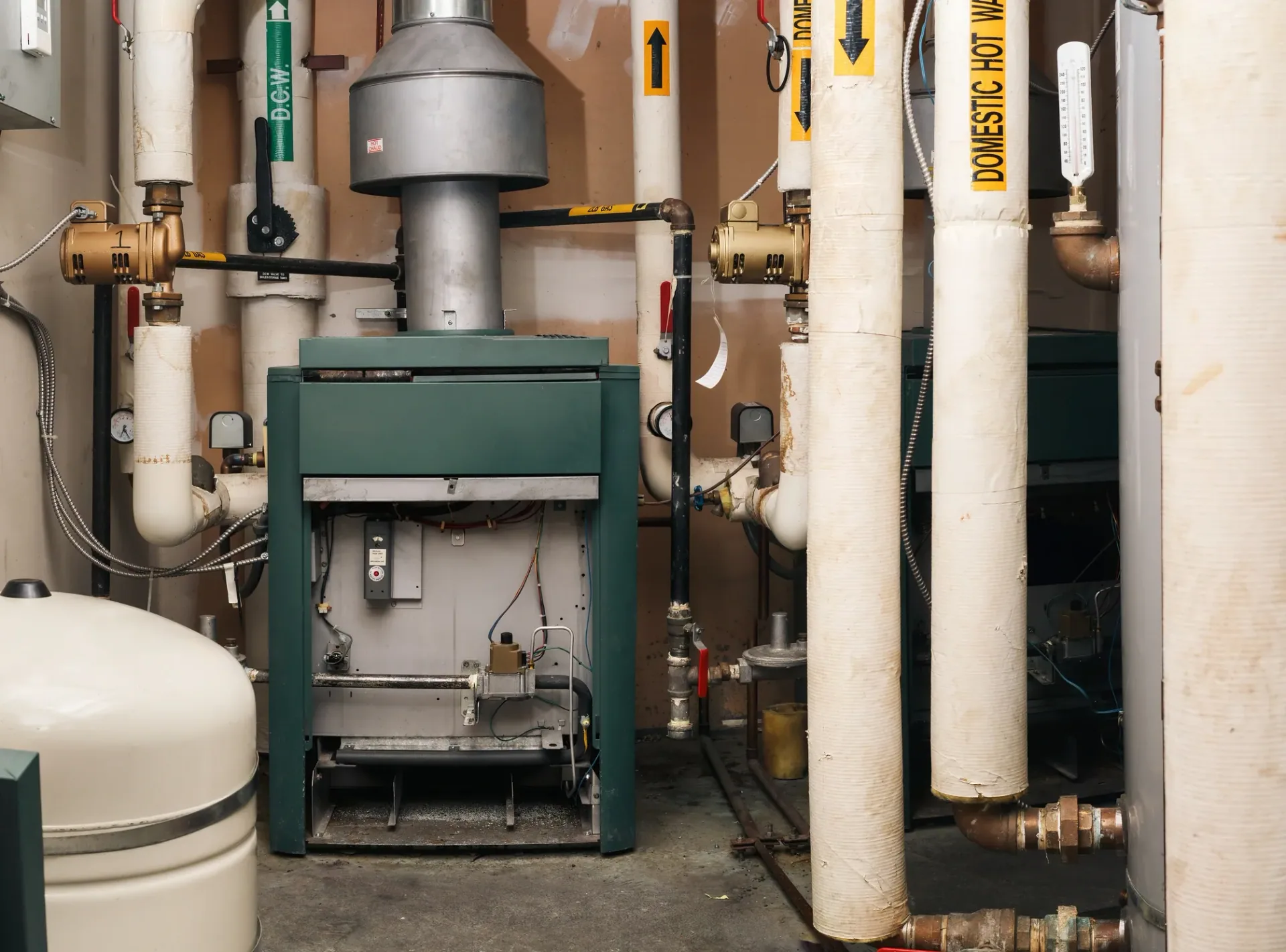 Green cast iron boiler insulated domestic hot water pipes mechanical room melros