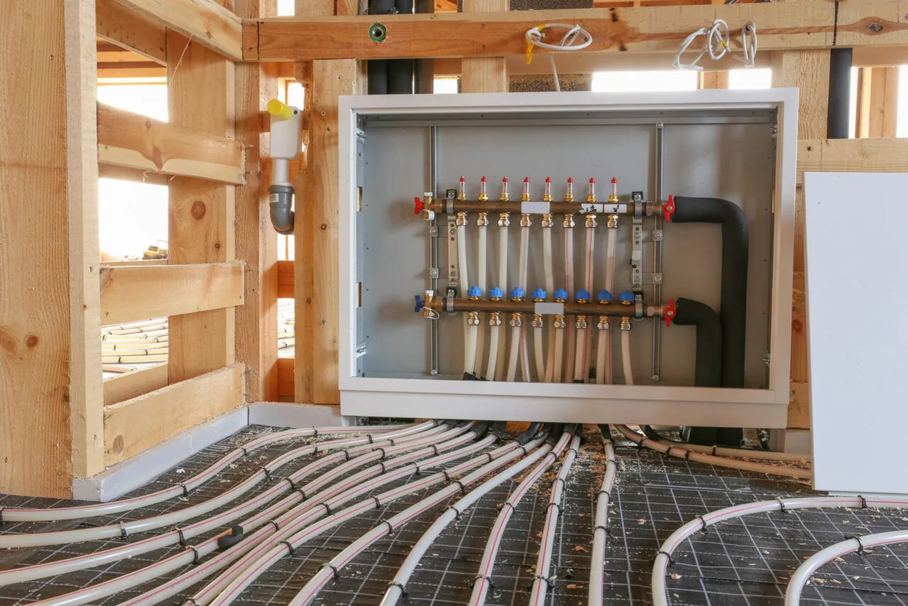 Radiant floor heating manifold cabinet pex tubing wood framing melrose hydronic